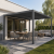 Przyścienna pergola 4 x 3 x 2,5m aluminiowa czarna, manualny dach, oświetlenie LED